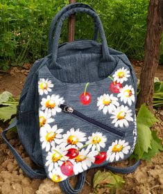 ♥ Cherries and Daisies Bagpack, Hadpainted Backpack, Cherries Bag, Cherry Backpack, Summer Bag ♥ HAND PAINTED BACKPACK by DiqnaDesign. ------- SIZE & DETAILS ------- Unique handpainted product Professionally hand-painted with lots of love. Measures: 30 x 30 cm ≈ 11.8 x 11.8 inches, Bottom width: 23 cm ≈ 9 inches Material: Textile This bag is fastened with a zipper All bags are hand painted with professional textile paint Because these are Original Hand Painted Designs I will not guarantee th Casual Handmade Canvas School Bag, Casual Everyday Hand Painted Bag, Casual Hand Painted Canvas Bag For Everyday Use, Casual Hand Painted Bags For Everyday, Hand Painted Shoulder Bag For Travel, Casual Hand Painted Bags For Daily Use, Hand Painted Backpack, Everyday Hand Painted Shoulder Bag, Casual Hand Painted Cotton Bag