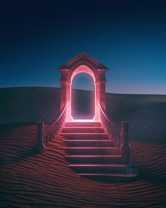 a stairway leading up to an open door in the desert at night with bright lights