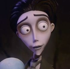 an animated character with big eyes holding a ball in his right hand and looking at the camera