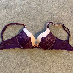 Perfect Condition. Never Worn. Tags Still Attached. Straps Are Adjustable And Detach At One End In The Back. It’s Purple Lace With Cream In The Background And There’s An Additional Coral Colored String In The Straps. Dream Angels Push Up Bra. Victoria's Secret Purple Underwire Bra, Fitted Purple Bra With Lace Trim, Victoria's Secret Purple Bra With Built-in Bra, 32d Bra, Cute Bras, Sleep Wear, Purple Lace, Coral Color, Push Up Bra