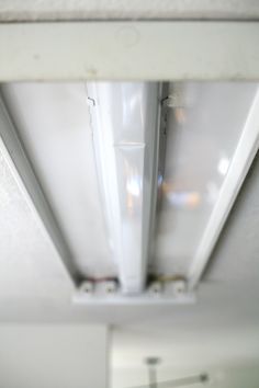 an overhead view of a light fixture in the ceiling