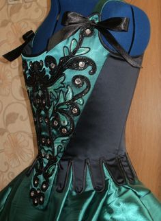 Fitted Black Corset For Dance, Gothic Fitted Corset For Dance, Green Corset With Boned Bodice, Black Embellished Fitted Corset, Green Corset With Boned And Fitted Bodice, Satin Overbust Corset For Costume, Satin Overbust Corset Dress For Costume, Overbust Satin Corset For Costume, Satin Corset Dress With Boned Bodice For Costumes