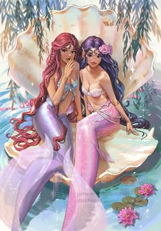 two pretty mermaids sitting on a shell in the water