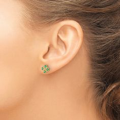 Quartets of dazzling natural emerald gemstones are embellished in the centers by shimmering round diamond accents in these eye-catching women's stud earrings. Fashioned in 14K yellow gold, the earrings secure in place with friction backs. Green Round Diamond Earrings Fine Jewelry, Green Diamond Earrings For Anniversary, Green Cluster Jewelry With Diamond Accents, Green Diamond Earrings For May Birthstone, May Birthstone Fine Jewelry Diamond Earrings, Fine Jewelry Green Diamond Earrings As Gift, Fine Jewelry Green Diamond Earrings For Gift, Green Gemstone Diamond Earrings As Gift, Green Gemstone Diamond Earrings For Gift