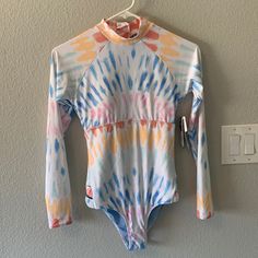 Brand New With Tags, Fits Like A Small White Long Sleeve Swimwear For Pool, White Swimwear For Surfing In Spring, White Beachy Bodysuit For Pool, Multicolor Bodysuit For Surfing In Summer, Summer Pool Bodysuit With Long Sleeves, Spring Multicolor Bodysuit For Poolside, Multicolor Long Sleeve Swimwear For Spring, Summer Long Sleeve Bodysuit For Pool, Spring Casual Pool Bodysuit