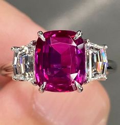 ALL THESE PHOTOS WERE TAKEN WITH AN ORDINARY IPHONE & HAVE NOT BEEN EDITED OR ENHANCED IN ANY WAY. VIDEO LINKS: https://youtube.com/shorts/6U33vXL-fL0?feature=share Up For Sale is an Gorgeous Natural Unheated Ruby & Diamond Three Stone Ring in Solid Platinum. This Ring was Made by us Here in New York City & is of the Finest Quality. The Center Stone is an Exceptional Natural GRS Certified 3.01 Ct Cushion Cut Ruby that Measures Approx 9.3 x 7.7 mm, was Mined in Mozambique & Has NOT Been Heated or Luxury Ruby Three Stone Rings, Luxury Three Stone Ruby Ring, Luxury Red Ruby Ring With Accent Stones, Luxury Gia Certified Cushion Cut Ruby Ring, Luxury Lab-created Ruby Ring, Luxury Red Three Stone Jewelry, Luxury Red Three-stone Jewelry, Luxury Red Cushion Cut Ruby Ring, Luxury Red Platinum Rings