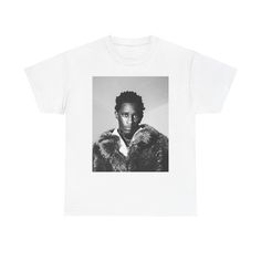 Turn heads with this bold Young Thug graphic T-shirt, a must-have for any fan of the rap icon. Made from 100% high-quality cotton, this tee delivers maximum comfort and breathability for everyday wear. Featuring a striking design inspired by Young Thug's unique style and swagger, it's perfect for adding an edge to your wardrobe. Whether you're hitting a concert or just keeping it casual, this shirt will keep you fresh and ready to stand out. Material: 100% Cotton -Comfortable and breathable fabric -Bold Young Thug graphic design -Classic fit with short sleeves -Ideal for fans of Young Thug and urban streetwear #FreeThugger Grab yours now and rep Young Thug in style! Hip Hop Cotton T-shirt For Streetwear, Cotton Streetwear T-shirt, Pop Culture Cotton T-shirt For Streetwear, Unisex Hip Hop Cotton T-shirt, Unisex Pop Culture T-shirt For Streetwear, Pop Culture T-shirt With Screen Print For Streetwear, Fan Apparel T-shirt With Graphic Print For Streetwear, Pop Culture Screen Print T-shirt For Streetwear, Fan Apparel Graphic Print T-shirt For Streetwear