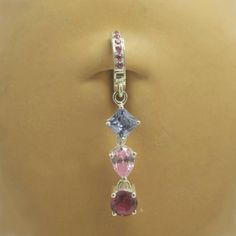 Above is a beautiful solid 925 silver belly button ring, with a purple, pink, and hot pink charm and hot pink pave clasp.  The Charm is 7/8 inch long (22mm) Total Length of TummyToy is 1 1/2 inch (38mm). No other body jewelry offers the convenience, security and beauty of real jewelry like TummyToys.  Imagine the enjoyment you will have when wearing this gorgeous piece!We take our time making our naval rings so it can come out perfect for you our costumers .We want you to feel special when you w Hot Pink Belly Button Piercing, Pink Dangle Belly Rings As Gift, Pink Dangle Belly Rings For Gift, Sterling Silver Dangle Belly Rings For Gift, Nickel-free Pink Belly Rings As Gift, Sterling Silver Pink Charms Jewelry, Pink Sterling Silver Charm Jewelry, Pink Cubic Zirconia Jewelry With Charms, Pink Sterling Silver Jewelry With Charms