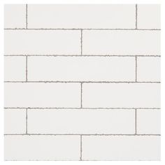 a white brick wall with grey lines on it