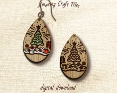 wooden earrings with christmas trees on them