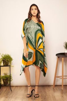 Green, orange and yellow batwing sleeves V neck kaftan with all over wavelet print and hand embellishments detailing. - Aza Fashions V Neck Kaftan, Kaftan Pattern, Kaftan Women, Kaftan For Women, Satin Color, Orange And Yellow, Green Satin, Batwing Sleeve, Bat Wings