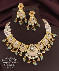 Description :- Indian Polki Jewelry Jewellery Necklace Set/ Bollywood Style Gold choker set Finish South Indian bridal rishi Jewelry Gift yourself a royal look with this perfectly crafted kundan necklace set from Manalisstudio. Crafted with high quality kundan stones and pearls, it is impressive in design. The green enamel artwork adds perfect texture to the design. Perfect for weddings and festivities, this antique necklace set should be put on with your favorite sari or lehenga. 100% Satisfact Luxury Oxidized Finish Temple Necklace For Festivals, Designer Kundan Necklace For Weddings And Festivals, Designer Gold Kundan Necklace For Wedding, Designer Multicolor Jewelry For Weddings, Designer Wedding Necklaces For Festive Occasions, White Temple Jewelry Sets For Reception, Designer Festive Wedding Necklaces, Designer Kundan Necklace With Meenakari For Festivals, Designer Meenakari Jewelry For Wedding