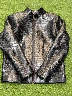 Men's Real Crocodile / Alligator Leather Jacket, Crocodile Embossed Jacket, Handmade Alligator Textured Genuine Leather Jacket  gift for him Premium Quality Real Sheepskin/goat Leather. Black leather jacket Customize size for perfect fit. Strong Metallic Zips. One Inside Pockets. Front Zip closure. Two pockets on waist Return and Refund Policy: This item includes a 100% Money Back Guarantee! If you are not completely satisfied with your purchase for any reason, you received damaged, faulty produ Luxury Crocodile Pattern Leather Jacket For Winter, Fitted Luxury Leather Jacket With Crocodile Pattern, Luxury Fitted Leather Jacket With Crocodile Pattern, Luxury Long Sleeve Leather Jacket With Crocodile Pattern, Luxury Leather Outerwear With Crocodile Pattern, Luxury Long Sleeve Outerwear With Crocodile Pattern, Crocodile Jacket, Motorcycle Chaps, Motorcycle Shoes