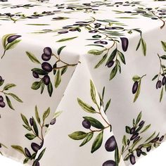 an olive print tablecloth with green leaves and black olives on white fabric,