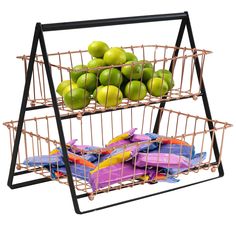 three tiered metal fruit basket with apples and bags in it, on top of each other