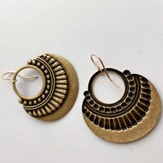 Large antiqued bronze finish crescent moon Boho hoops with geometric detail hang from high quality 14K gold fill simple French loop ear wires.

 	Matte silver pendants are stamped brass, 1 3/4″ long and 1 1/4″ wide.
 	Lightweight but substantial.
 	These earrings are best sellers in both brushed matte brass gold and in sterling silver finish.
 	Ear wires are hypoallergenic 14K gold fill for sensitive ears.
 	Also available antiqued silver with .925 sterling silver ear wires.
 	This design is onl Boho Hoop Earrings, Antique Earrings, Brass Gold, Silver Pendants, Sensitive Ears, Bronze Finish, Crescent Moon, Ear Wires, Antique Bronze