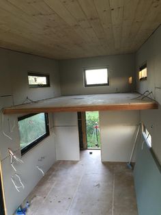 the inside of a tiny house with no windows or doors on the walls and floor