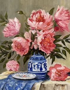 an oil painting of pink flowers in a blue and white vase on a table cloth