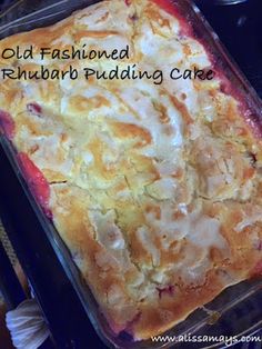 an old fashioned rhubarb pudding cake in a glass dish on the stove