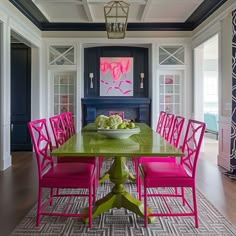 Bold living room with orange sofa and electric blue accent wall Vintage Kitchen Table And Chairs, Dining Table Color Ideas, Modern Chinoiserie Living Room, Pink And Green Kitchen, Pink Dining Room, Magenta Walls, 70s Color Palette, Colorful Dining Room, Inviting Dining Room