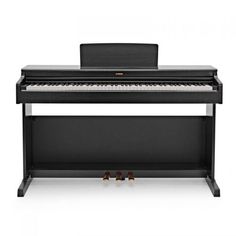 a black piano sitting on top of a white floor