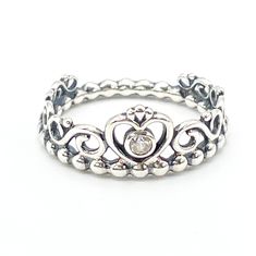 Authentic Size 7 (European Size 54) PANDORA Sterling Silver Princess Tiara Crown Ring - 190880CZ. For the princess in you. This fairytale design Tiara ring is the perfect gift for the princess in your life. This ring looks fantastic on its own or combined with nearly any other Pandora stacking ring to create a design that is uniquely you. Ring is pre-owned and in great condition. This beautiful ring will add a special touch to any stacking ring design. All my jewelry items come in a black velvet Silver Princess Ring For Wedding, Pandora Rings Stacked, Fairytale Design, Necklace With Kids Names, Mom Necklace Personalized, Tiara Ring, Princess Tiara, Tiara Crown, Velvet Jewelry