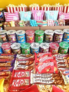 an assortment of snacks and candy are on display