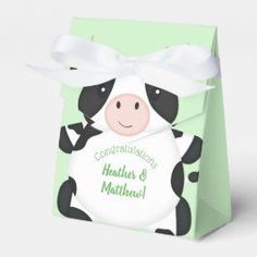 a small bag with a cow on it's side and the words congratulationss for mothers and mother