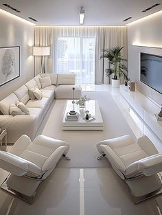 a modern living room with white furniture and large screen tv on the wall above it