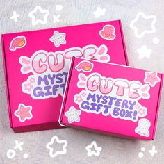 two pink boxes with stickers on them