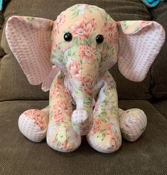 "Stuffed animal elephant made from the clothing of a loved one who passed to help keep their memory alive. Can also be made from a child's clothing to preserve their childhood memories. *Hand made using a huggable patterns pattern. This elephant sits approximately 13\" tall. If you'd like to order a memory elephant, please place your order and I will reach out to you regarding next steps for sending me your clothing items. If you have any special instructions or questions, please send me a messa Memory Elephant, Memory Bears Pattern, Cushion Ideas, Bear Patterns Free, Elephant Stuffed Animal, Memory Pillow, Keepsake Bear, Memory Quilts, Memory Bears