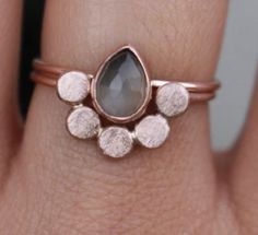 Love that this one is two rings and some of the feater is on the metal. Faceted Rose Gold Ring Jewelry, Anniversary Rose Gold Hammered Stackable Rings, Rose Gold Teardrop Gemstone Rings, Faceted Rose Gold Ring, Teardrop Rose Gold Gemstone Rings, Rose Gold Gemstone Stackable Rings, Rose Gold Teardrop Jewelry With Bezel Setting, Stackable Rose Gold Moonstone Ring, Stackable Round Moonstone Ring In Rose Gold