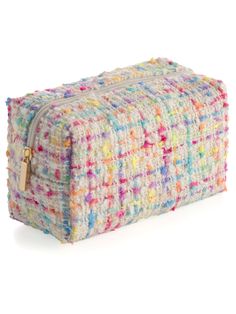 a multicolored knitted cosmetic bag with zippers on the front and side