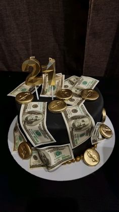 a cake decorated with money and gold coins