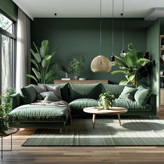 a living room with green walls and plants on the couches in front of them