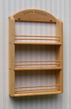 a wooden shelf with two shelves on it