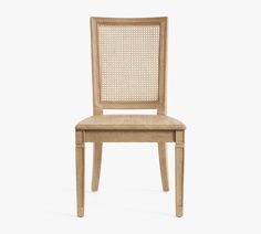 a wooden chair with wicker backrests on a white background, side view