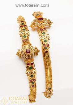 22 Karat Fine Gold Uncut Diamond Kada with Rubies & Emeralds - Set of 2 (1 Pair) Uncut Diamond Weight: 1.18 Carat Ruby & Emerald Weight : 3.50 Carats Width on the sides of Kada: 0.20 inches Width at the Center of the Kada : 0.70 inches Note: This item comes with a Screw and hinge so that you can open it up for easy wearing. Diamond Kada, 22k Gold Bangles, Indian Gold Jewelry, Gold Bangles Indian, Indian Bangles, Gold Bangles For Women, 22k Gold Jewelry, Jewelry Designing, Gold Jewelry Stores