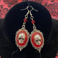 Victorian Goth Emo Hanging Dangling Skull Earrings. New, No Tag. This Item Participates In The 2 Items For $25 Sale. To Find All Participating Items, Click The Savage-Sale Style Tag In This Listing. Lightweight Approximately 2" X 1" Participates In The 2 For $25 Sale Nickel-free Skull Jewelry For Party, Red Punk Earrings For Gifts, Handmade Punk Red Jewelry, Red Nickel-free Jewelry For Halloween, Nickel-free Red Halloween Jewelry, Handmade Red Punk Jewelry, Red Metal Halloween Earrings, Gothic Red Nickel-free Earrings, Victorian Goth