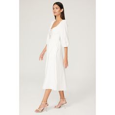 White cotton blend (96% Organic Cotton, 4% Spandex). A-line. 3/4 sleeves. Sweetheart. Imported. Feminine Midi Dress With 3/4 Sleeves, Chic Cotton Half Sleeve Dress, Chic Half Sleeve Cotton Dress, Chic Cotton Dress With Half Sleeves, Feminine Summer Midi Dress With 3/4 Sleeves, Feminine Midi Dress With 3/4 Sleeves For Spring, White Long Sleeve Fit And Flare Midi Dress, Feminine 3/4 Sleeve Midi Dress For Spring, White Fit And Flare Long Sleeve Midi Dress