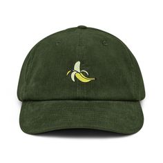 A hat made of corduroy? That's a yes! Get your hands on a hat that'll serve you for ages. The corduroy fabric has stood the test of time thanks to its best features--softness, affordability, and durability. Get yours now! This peeled banana embroidered unisex cap comes in one size for adults. * 100% cotton corduroy * Soft, unstructured crown * Cotton twill sweatband and taping * Adjustable buckle This product is made especially for you as soon as you place an order, which is why it takes us a bi Banana Hat, Peeled Banana, Corduroy Hat, Dad Cap, Corduroy Fabric, Dad Caps, Hat Making, Trucker Cap, Cotton Twill