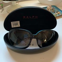 These Chic Black And Turquoise Ralph Lauren Sunglasses Are Simple And Elegant For Summer. New With Case, These Are In Wonderful Condition. Navy Sunglasses, Ear Cuff Chain, Ralph Lauren Sunglasses, Purple Sunglasses, Grey Sunglasses, Gold Ear Cuff, Tortoise Shell Sunglasses, Tortoise Sunglasses, Ralph Lauren Women