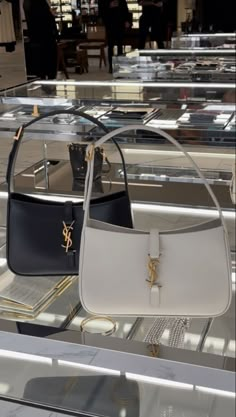 Ysl Blanc Vintage Bag, White Ysl Purse, Ysl Hobo Bag White, Old Money Bags Aesthetic, White Shoulder Bag Outfit Aesthetic, Classy Bags Handbags, Hailey Bieber Ysl Bag, Classy Bags Aesthetic, Old Money Shoulder Bags