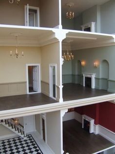 the inside of a doll house with three floors