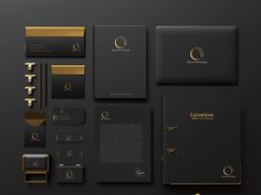 a black and gold stationery set with business cards