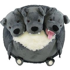 two stuffed dogs sitting on top of each other with their mouths open and tongue out