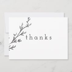 a thank card with the word thanks written in black ink on it, and an image of