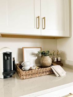 the kitchen counter is clean and ready to be used for breakfast or coffee break,