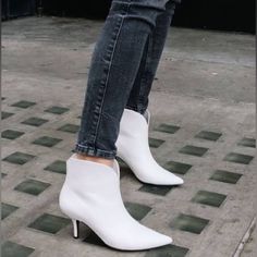 An Everyday Bootie Crafted In White Leather. This Style Comes Finished With A Flattering Pointed-Toe Shape And Sturdy Low Heel. - Pointed Toe; Functional Side Zip - Cutout Detail At Front Topline - 2.5" Covered Kitten Heel - Leather Upper, Leather Lining, Leather Sole - Color: White - New With Tags Fits True To Size, Order Your Normal Size # Revolve, California, Emily In Paris, Nyc, Cowgirl, Western, Fall, Coastal, Academia, Rock ‘N Roll Aesthetic, Kitten Heel, Boho Chic, Cowboy Spring Booties With Sculpted Heel, Spring Boots With Padded Low Heel, White Heeled Boots With Padded Heel, Medium Width, White Heeled Boots With Padded Heel, Spring Boots With Padded Ankle And Pointed Toe, White Heeled Boots With Sculpted Heel And Medium Width, Spring Pointed Toe Booties With Sculpted Heel, Spring Booties With Sculpted Heel And Pointed Toe, Spring Low Heel Padded Heel Boots