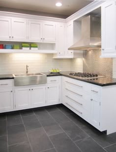 the kitchen is clean and ready for us to use in its new owner's home